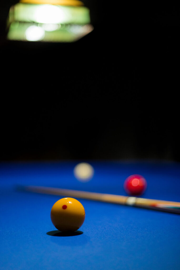 Three cushion billiards Game consist in to carom the cue ball of